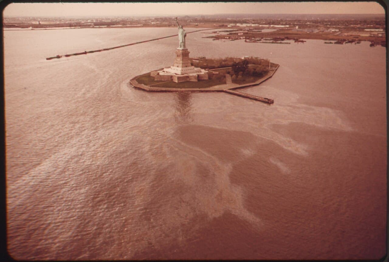 The Statue of Liberty standing in New York Harbor